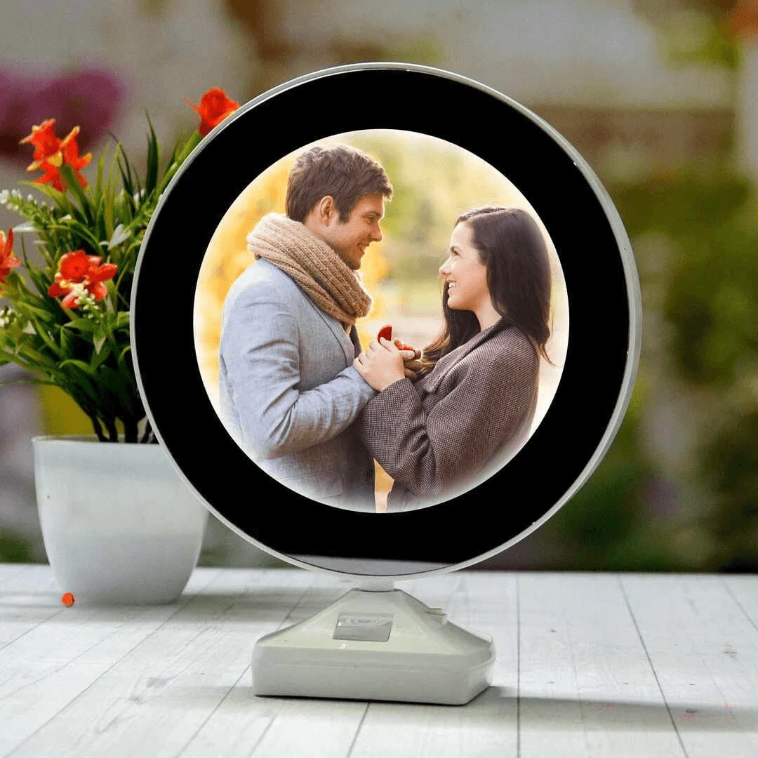 Personalized Round Magic Mirror LED Photo Frame - MJA Print N Gift Personalized Round Magic Mirror LED Photo Frame showing glowing couple photo on a white desk